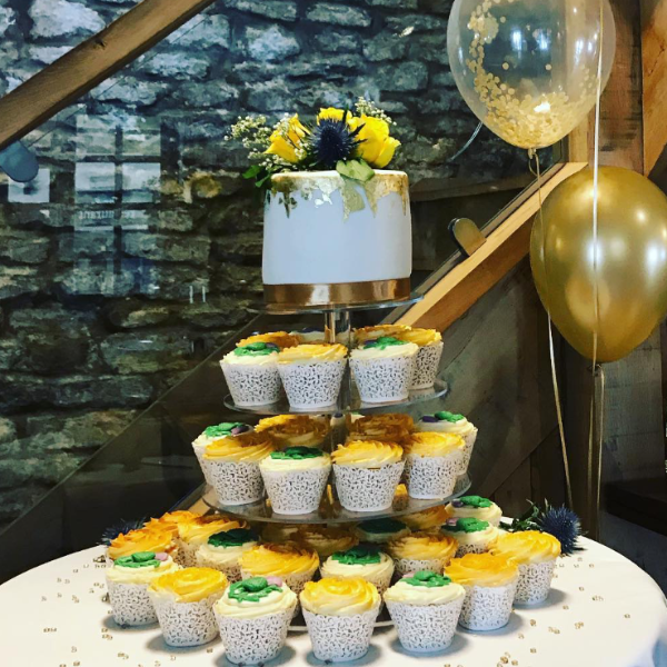 Wedding cake with balloons at the Duke of Wellington Stanwick